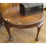 A 19th century circular mahogany centre or occasional table with shaped top, raised on cabriole legs
