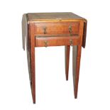 An early 20th century oak twin drop leaf occasional table with shaped top, two drawers under with