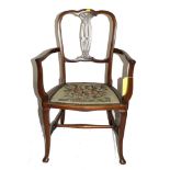 A 19th century French walnut occasional or bedroom chair with wavy top rail, elaborate fret work