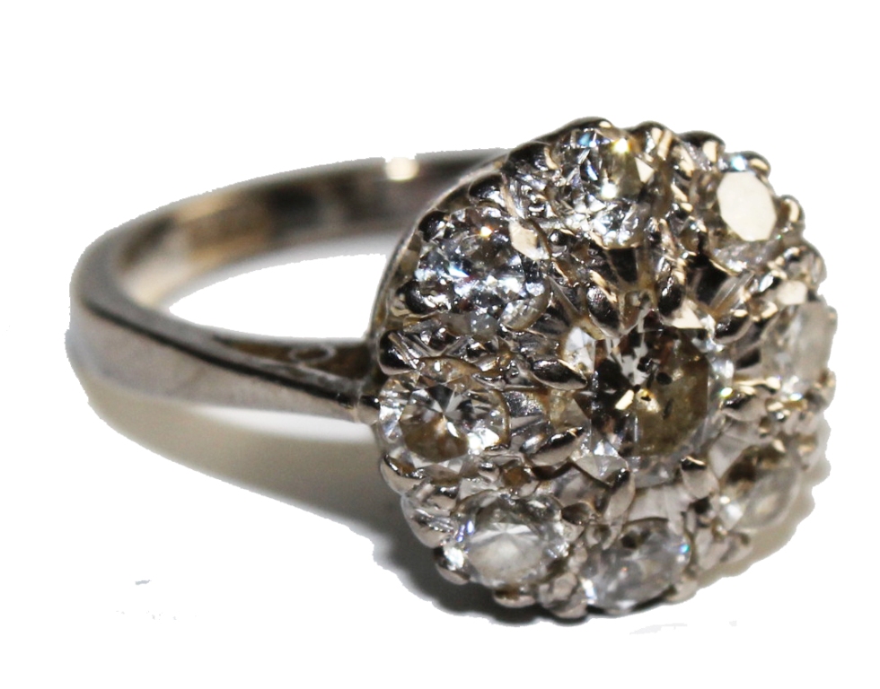 An 18 carat white gold diamond cluster ring