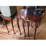 A 19th century style nest of three tables with shaped oval tops, raised on cabriole legs 53H x 60W x