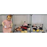 A Raynal celluloid doll, a painted canvas doll, Bashful four Mickey Mouse and two Minnie Mouse