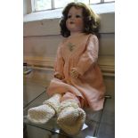 An Armand Marseille, Germany, vintage doll, serial number 390, 70cm long