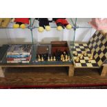 A vintage chess set and board, a selection of six Enid Blyton Famous Five hardback adventure