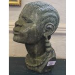 Lazarus Tandi, Zimbabwe, born 1955, a soapstone bust of a male figure, 28cm high