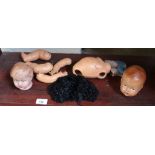 A selection of vintage doll parts