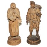 A pair of Bongiovanni Vaccaro de Callagirone hand carved terracotta figurines, made for the