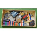 A small selection of silver swimming medals, etc
