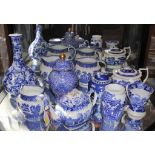 A mixed assortment of late 19th century and early 20th century blue and white ceramic table ware, to