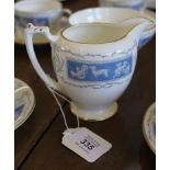 A Coalport forty-piece tea and coffee service in the Revelry range with blue and white classical