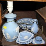 An assortment of Wedgwood Jasperware household items, to include plates fitted for hanging, lamp