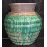 A Shelley circular ceramic vase with green and beige drip-glaze effect, 17cm high £40-60