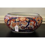 A 19th century Japanese Imari elliptical fruit or flower bowl with blue and ochre designs, 23cm s