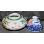 Two late 19th century Chinese brush washers, the larger in famille verte, 14cm diameter, and the