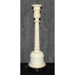 An ivory column lamp with a Bakelite base, 28cm high The Art Deco Carvings of W. G. Collins (1872-