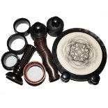 A selection of African blackwood measures and napkin rings The Art Deco Carvings of W. G. Collins (