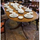 *A Regency-style mahogany and cross banded 'D' end extending dining table with ebony string inlay