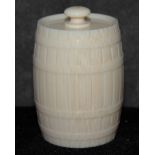 An ivory barrel shaped container with cover, 5.5cm  The Art Deco Carvings of W. G. Collins (1872-