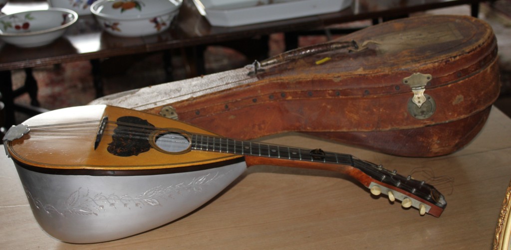 The Merrill bowl back mandolin (1894 - 1898) with floral engraved aluminium bowl and original