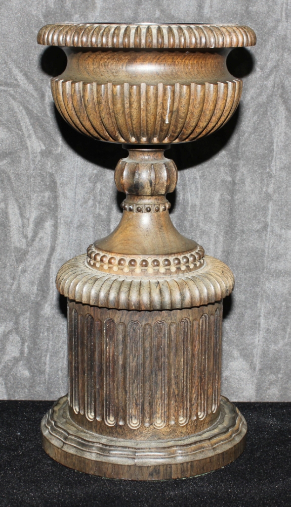 A carved African backwood urn, 24cm high The Art Deco Carvings of W. G. Collins (1872-1959)