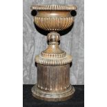 A carved African backwood urn, 24cm high The Art Deco Carvings of W. G. Collins (1872-1959)