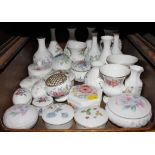 A broad selection of ceramic lady's vanity table items, to include ring boxes, powder puffs,