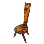 A Continental-style 19th century hall chair with elaborate marquetry to the support and octagonal