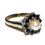 A 9 carat sapphire and cultured pearl ring
