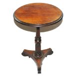 A Regency rosewood circular wine or occasional table with moulded top, raised on a baluster fluted