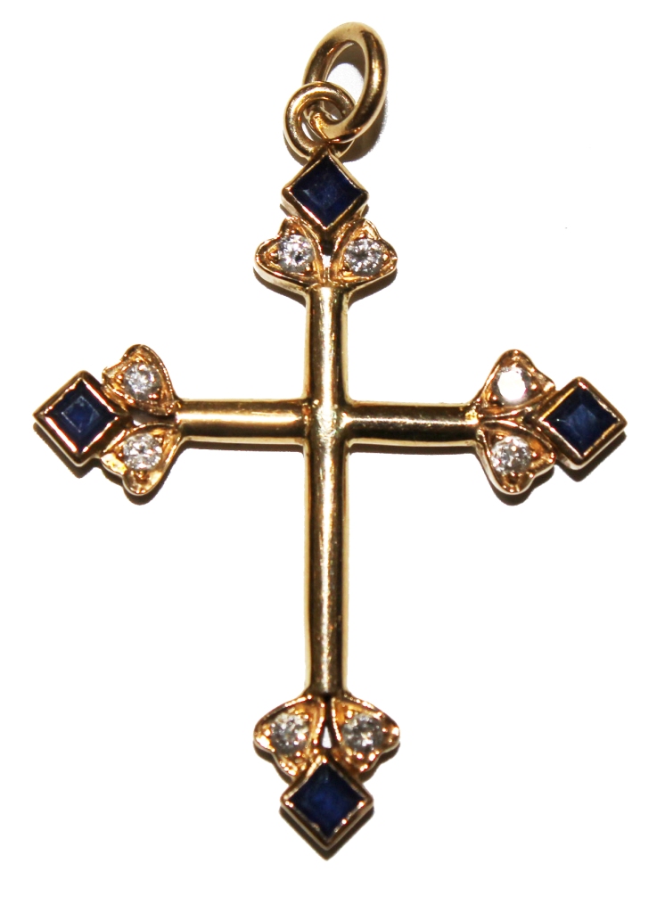 A sapphire with diamond set cross