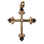 A sapphire with diamond set cross