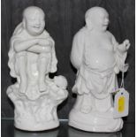 Two Chinese blanc de chine figurines on stylized bases, 20cm high each