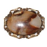 A gold agate mourning brooch