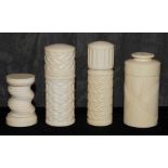 Four ivory cylindrical pots, 5.5 - 9.5cm high The Art Deco Carvings of W. G. Collins (1872-1959)