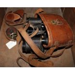 A pair of vintage binoculars by A. Kershaw and Son's, Leeds, 1918 with leather carry case and an