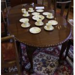 A Georgian-style mahogany Chippendale design extending 'D' end dining table with gadrooned edge to