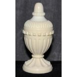 A small ivory urn shaped salt seller, 10cm high The Art Deco Carvings of W. G. Collins (1872-1959)