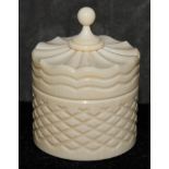 An ivory pot with cover, 5.5cm  The Art Deco Carvings of W. G. Collins (1872-1959) Worshipful