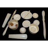 A miscellaneous ivory paper knife and lids, etc The Art Deco Carvings of W. G. Collins (1872-1959)