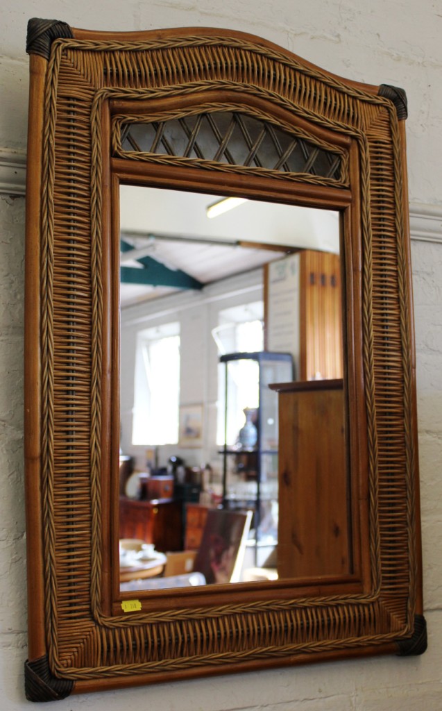 A bamboo and wicker framed oblong wall mirror, 85cm x 47cm