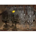 A broad selection of cut crystal drink ware, to include a Thomas Webb trumpet shaped vase