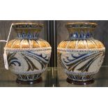 A pair of Doulton Lambeth circa 1882 baluster shaped vases by Florence E. Barlow, each incised