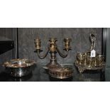 Two 19th century silver plated wine bottle coasters, a two-branch table candelabra and a circular