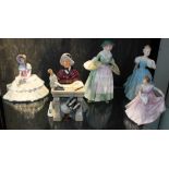 A Royal Doulton ceramic figurine of 'School Marm' and four other figurines of ladies. Condition -