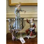 A Capodimonte highly ornate ceramic figurine of Romeo and Juliet scene on a stylized base, 30cm