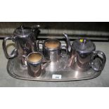 A mid 20th century hotel plate four piece tea service on an oval tray with pierced border