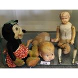 A clockwork doll with celluloid head, 22cm long, a composition doll and velvet Minnie Mouse,