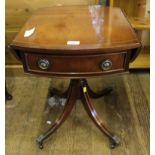 A Georgian-style mahogany smaller sized sofa table with string inlay to the top, twin drop leaves,