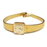 A lady's 18 carat gold Omega wrist watch