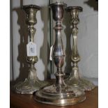 A pair of 19th century French-style silver plated candlestick holders of baluster form with acanthus